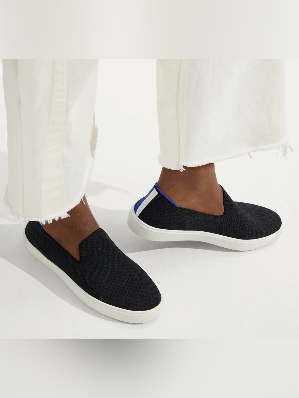 Rothy's Black Knit Original Slip-On Sneakers with Blue & White Heel Tabs - Picture 2 of 7